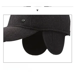 Detailed view of the winter baseball cap featuring warm earflaps and metal Sports Style tag