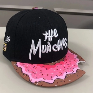 Detail of THE MUNCHIES embroidery and donut pattern brim with creative bite mark notch