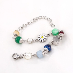 Colorful beaded daisy charm bracelet with silver metal cubes and lobster clasp closure