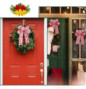 Detail of red and white Christmas bows with reindeer patterns for wreath decorations