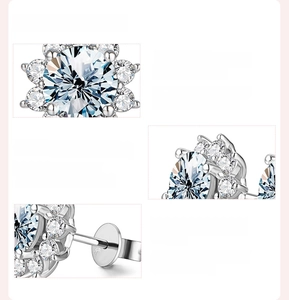 Macro view of D VVS1 Moissanite sunflower earrings with 925 sterling silver hallmarks