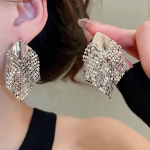 Exaggerated silver geometric rhombus stud earrings with shimmering metal mesh tassels