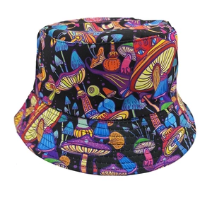 Detail of vibrant mushroom graffiti print on a black street-style reversible bucket hat