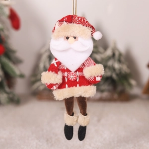 Detail view of plush Santa Claus ornament with plaid fabric and soft knitted textures