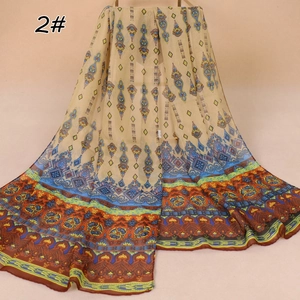 Detail of bohemian geometric print on lightweight beige chiffon scarf for women