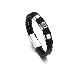 Close-up of black braided leather bracelet with silver magnetic clasp and cross element