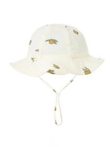 Detail of baby cotton sun hat with lemon print and adjustable chin strap on white background