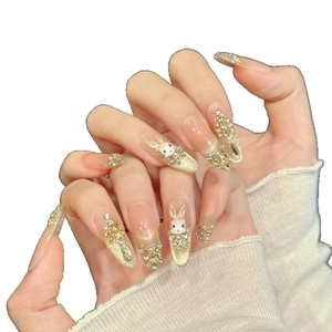 Unghie finte artigianali sfumate rosa con coniglio 3D in cristallo e glitter oro