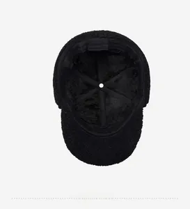 Detailed top view of the black plush fleece lining with reinforced six-panel stitching