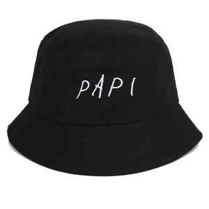 Detailed view of white PAPI embroidery on a black cotton bucket hat with fine stitching