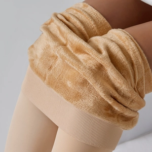 Detail of thermal leggings with high-density fleece lining and elastic ribbed waist