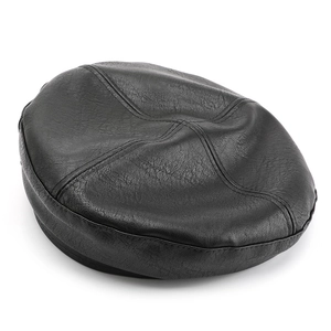 Vintage black leather octagonal beret cap with premium texture shown from top view