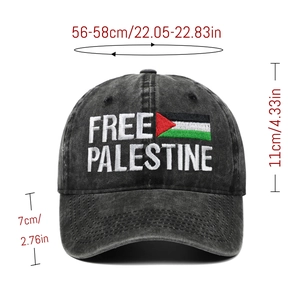 Detail view of embroidered Free Palestine text and flag on washed grey cotton baseball cap