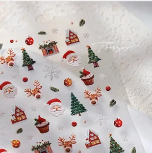 Vue détaillée d'autocollants 3D de Noël pour ongles avec texture de tricot gaufré