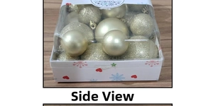 Detailed view of gold matte and glitter Christmas ball ornaments in festive box packaging