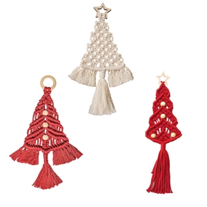 Three-piece handmade macrame Christmas tree wall hangings in red and cream white cotton