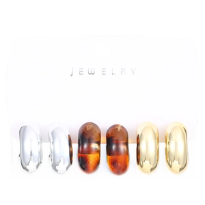 Three-pair vintage CCB hoop earrings set in silver, gold, and tortoise shell patterns