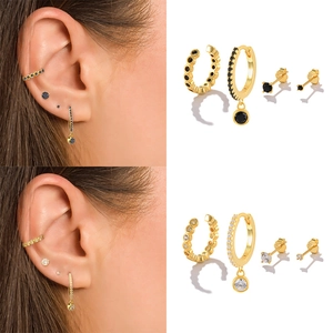 S925 sterling silver 4-piece gold earring set with black and white crystals in four-grid view