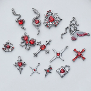 Gothic alloy charms with red rhinestones in spider, heart, and cross shapes