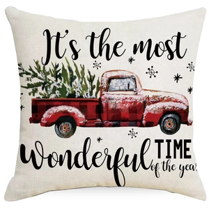 Christmas pillow cover with red truck and tree design on a clean white background
