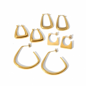 Set of four pairs of minimalist geometric trapezoid and hoop earrings in gold finish
