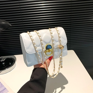 White quilted faux leather chain crossbody bag with golden hardware lock closure