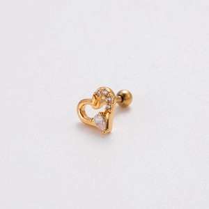 Detail of gold heart tragus stud with drop-cut crystal and screw ball back closure