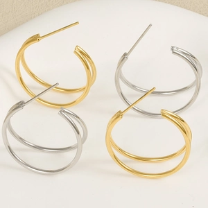 Detail of layered double hoop gold and silver 304 stainless steel earrings