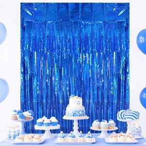 Blue metallic tinsel curtain backdrop for mermaid theme birthday party decoration