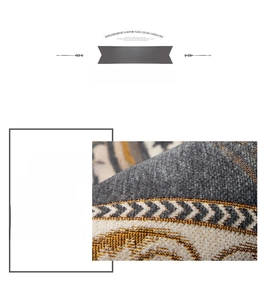 Detail of jacquard woven door mat showing thick grey and yellow fiber texture and weaving