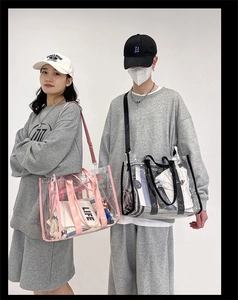 Lifestyleshots showing models wearing pink and black PVC transparent tote bags in white studio