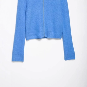 Women's royal blue zip-up knit cardigan with ribbed cuffs and refined wool-like texture