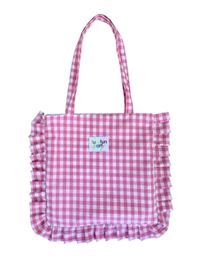 Pink checkered ruffle shoulder bag with cute lace detail and fun party label for daily use