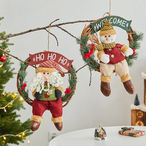 Christmas wreaths with Santa and snowman on rattan rings for holiday door decoration
