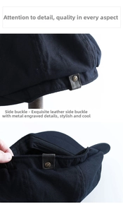 Dettaglio del berretto newsboy vintage con rivetto in metallo e fibbia laterale in pelle