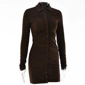 Detail of a brown bodycon dress featuring long sleeves, ruched fabric, and button-up front