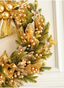 Detail of 50cm gold Christmas wreath featuring LED lights, ribbons and glitter ornaments