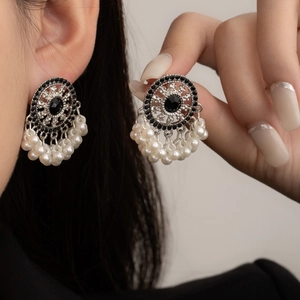 Ethnic Miao style silver earrings with black stones and elegant white pearl tassels