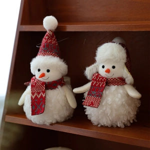 Set of plush Christmas snowmen with red knit hats and scarves for festive home decor