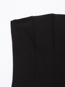 Macro view of high-quality black knitted fabric with fine stitching details