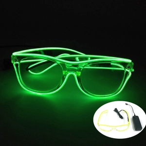 Close-up of green LED glasses with transparent frame and external battery controller