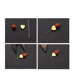 DIY jewelry making guide with stainless steel eye pins and red beads on dark background