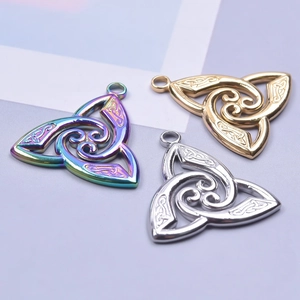 Three triangular Celtic witch knot pendants in iridescent, gold, and silver finishes