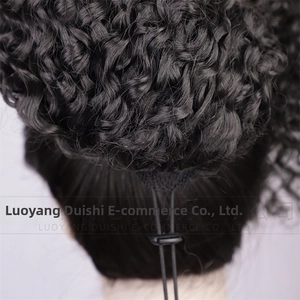 Detail view of deep black kinky curly hair extension with adjustable drawstring and buckle