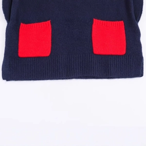 Short sleeve knit top in navy blue with vibrant red square pockets and ribbed hemline