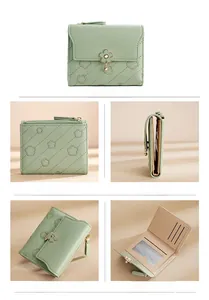 Detail view of light green PU leather wallet showing flower clasp and internal card slots
