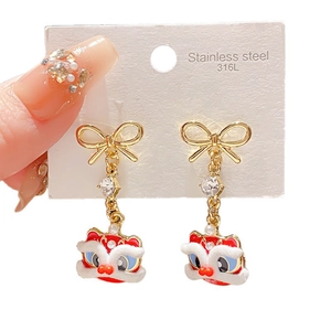 Lion dance drop earrings in 316L stainless steel with enamel bows and pearl details