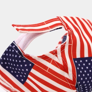 Detail of adjustable Velcro strap and American flag pattern on the back of kids baseball cap