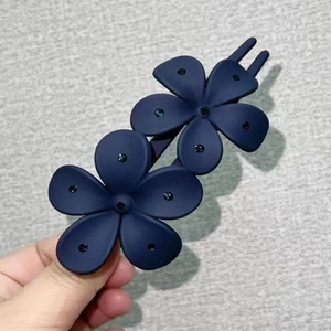 Elegant navy blue matte flower hair claw with sparkling rhinestones for women