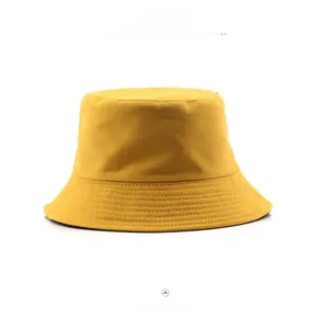 Front view of solid yellow cotton bucket hat with reinforced stitching and sun protection